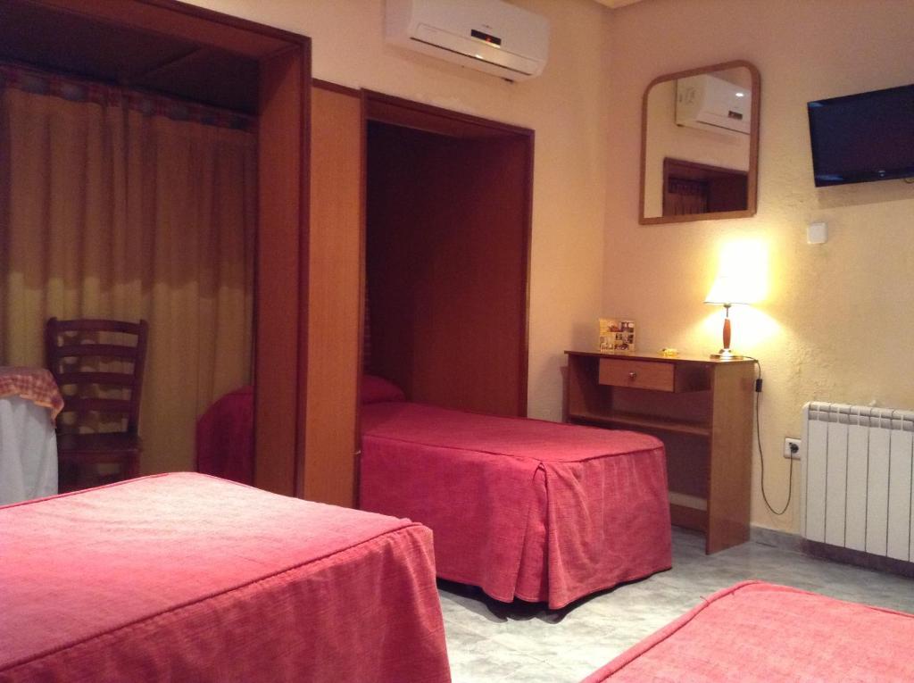 Hostal Santa Marta Aranjuez Rum bild