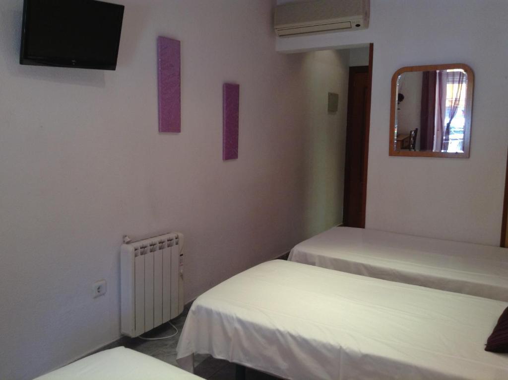 Hostal Santa Marta Aranjuez Rum bild